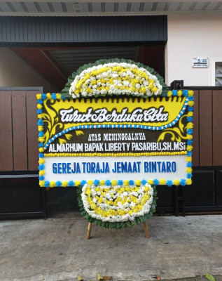 Papan Bunga Duka di Batulayang